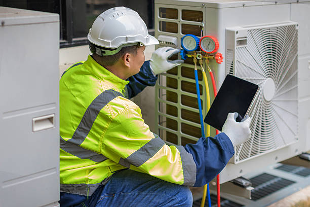 Professional Heat Pump Repair technician working in Franklin Square, NY